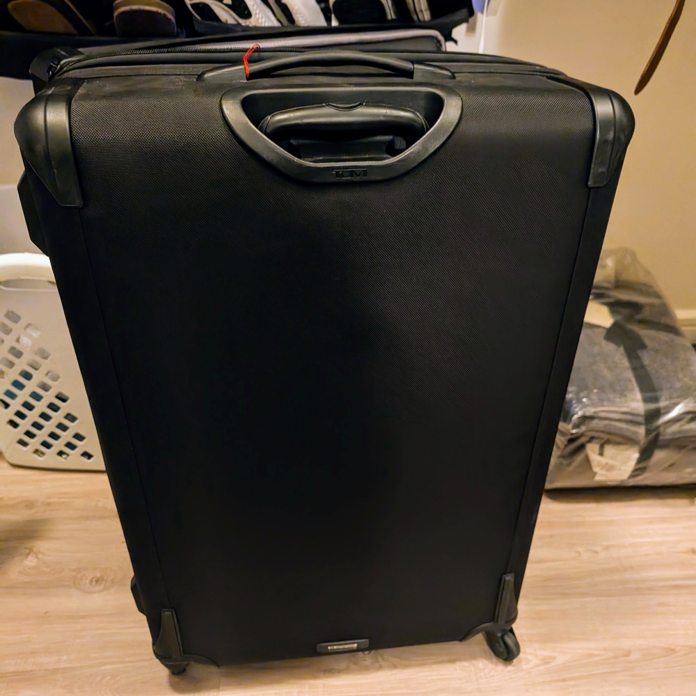 Tumi Black Large Travel Suitcase